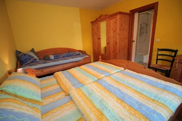 Schlafzimmer  Ferienwohnung Vieth in Sassnitz auf Rügen mit Sitzplatz im Garten
