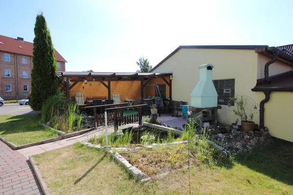 Grill  Ferienwohnung Vieth in Sassnitz auf Rügen mit Sitzplatz im Garten