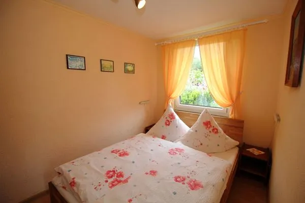 Schlafzimmer  Ferienhaus Frisch in Sassnitz auf Rügen mit Terrasse