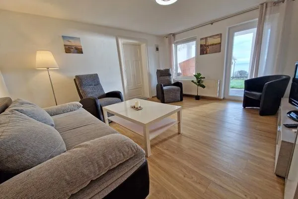 Wohnzimmer  Ferienwohnung Ostseeheim - 1. Reihe mit Meerblick