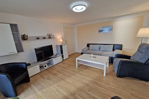 Wohnzimmer  Ferienwohnung Ostseeheim - 1. Reihe mit Meerblick