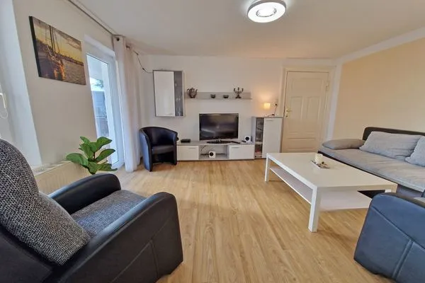 Wohnzimmer  Ferienwohnung Ostseeheim - 1. Reihe mit Meerblick