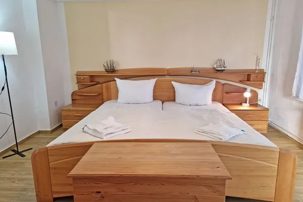 Bett  Ferienwohnung Ostseeheim - 1. Reihe mit Meerblick