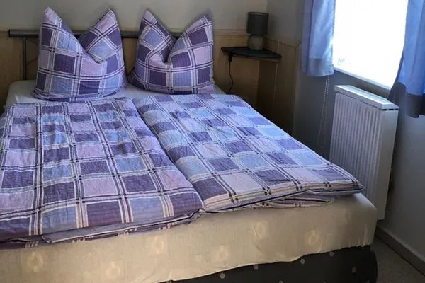 Schlafzimmer  Ferienhaus Karger in Sagard auf Rügen mit Terrasse und Garten