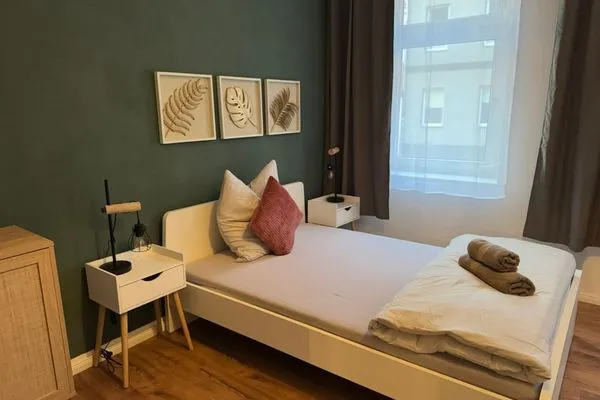 Schlafzimmer  Gemütliches Appartement "Hans" in Köthen mit 4 Schlafzimmern