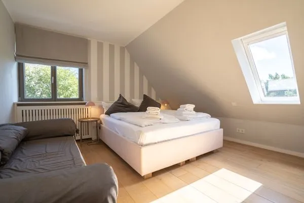 Doppelbett mit Schlafcouch  Niilön Fiirsicht