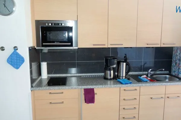 Küche / Küchenzeile Holiday Residenz I Ferienwohnung Inselheimat B42