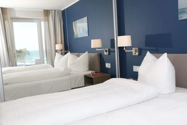 Schlafzimmer  FeWo Meerzeit Dachterrasse & Spa in Block 1