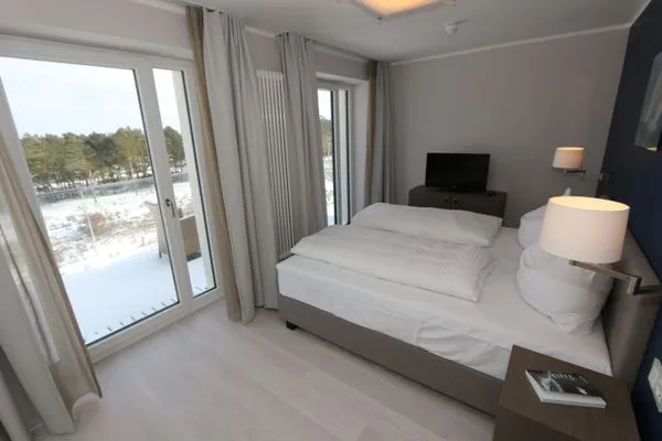 Schlafzimmer  FeWo Meerzeit Dachterrasse & Spa in Block 1