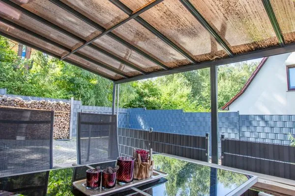 Ferienhaus Charlotta Waren (Müritz) - gr0ße Terrasse mit Grillplatz  Charlotta