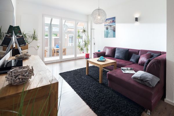  Ferienwohnung Aida City Norderney - Wohnzimmer