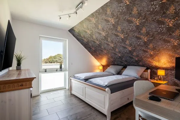 Schlafzimmer  Ferienhaus Backstein Huus 15