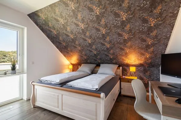 Schlafzimmer  Ferienhaus Backstein Huus 15