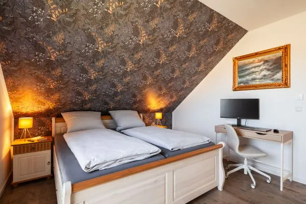 Schlafzimmer  Ferienhaus Backstein Huus 15