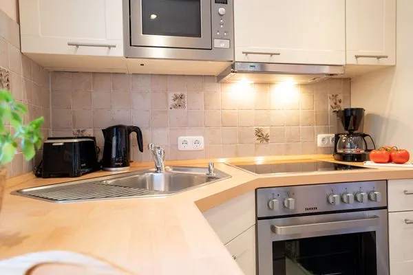 Küche / Küchenzeile  (ULM14a) Ferienhaus "Strandmuschel"