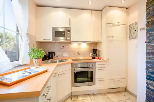 Küche / Küchenzeile  (ULM14a) Ferienhaus "Strandmuschel"