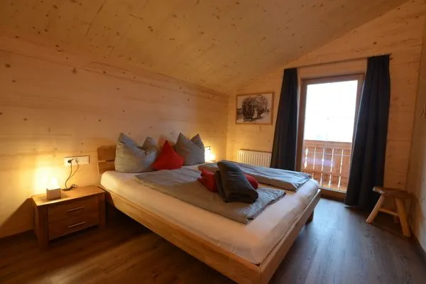 Schlafzimmer 2  Holzar Chalet - Feriendorf Via Claudia Haus 72