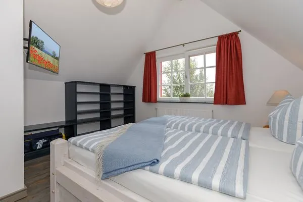 Schlafzimmer  Ferienhaus Haff & Meer