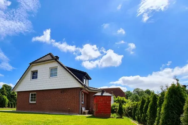 Fassade / Eingang  Ferienhaus Haffliebe mit Sauna und Kamin
