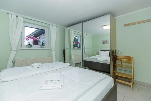 Schlafzimmer  Ferienwohnung Ostseetraum