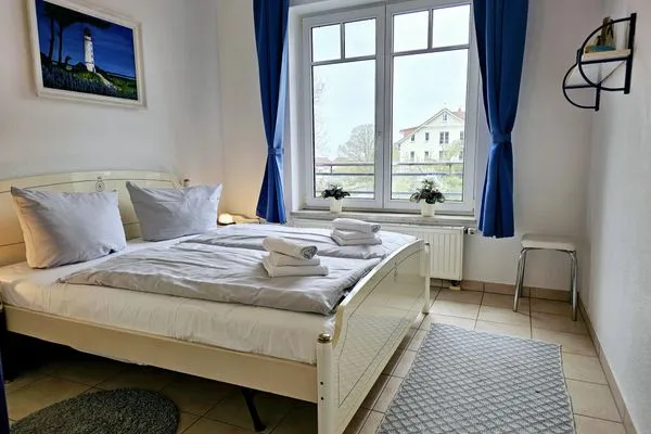 Schlafzimmer  Ferienwohnung am Salzhaff C6