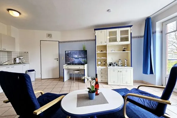 Wohnzimmer  Ferienwohnung am Salzhaff C6