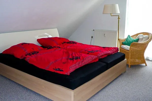 Schlafzimmer  Ferienwohnung Nest am Meer