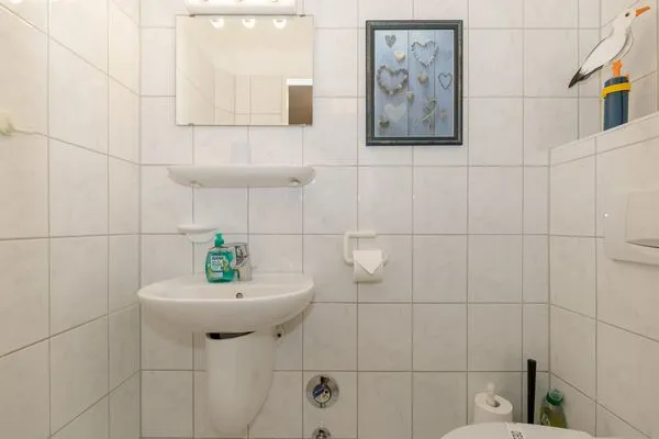 Badezimmer  Haus mit Ambiente Ferienwohnung Wald
