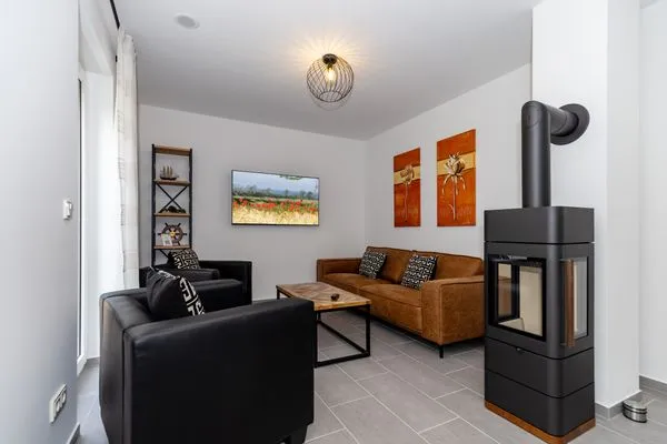 Wohnzimmer  Ferienhaus Stangenberg Bucht