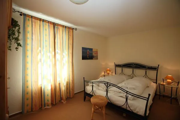 Schlafzimmer  Ostseewelle Ferienwohnung 13