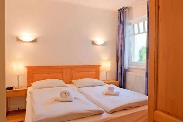 Schlafzimmer  Apartmenthaus Sonnenburg Ferienwohnung 12