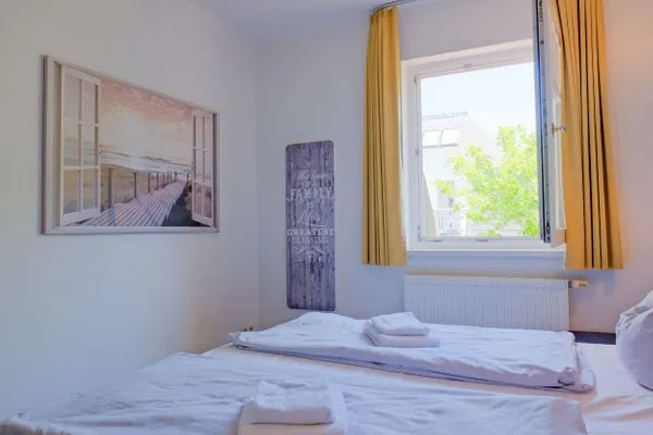 Schlafzimmer  Apartmenthaus Sonnenburg Ferienwohnung 13