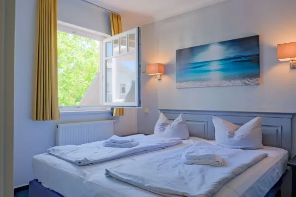 Schlafzimmer  Apartmenthaus Sonnenburg Ferienwohnung 13
