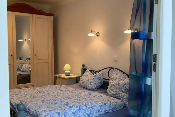 Schlafzimmer  Villa Laura Cottage Ferienwohnung 103