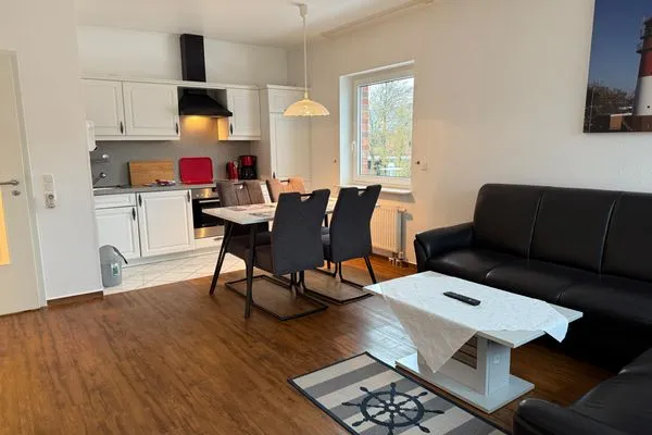 Wohnzimmer, Küche, Sofasitzecke, TV Haus Landweg 15 Wohnung 4