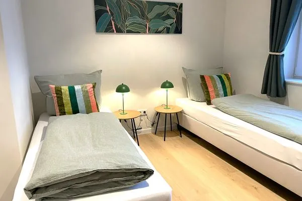 Schlafzimmer mit getrennten Einzelbetten (80x200cm)  Ferienhaus Landliv Huus