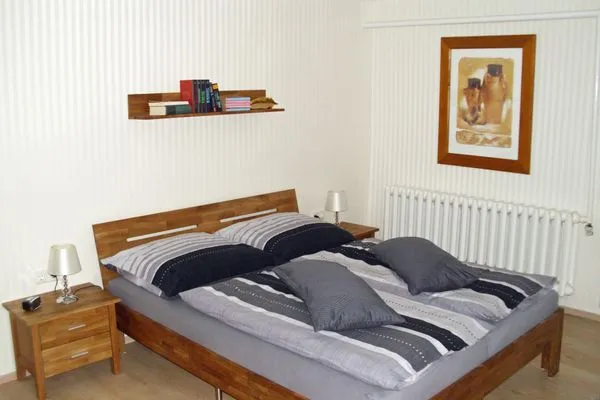 Bett  Ferienwohnung Am Stadtrand