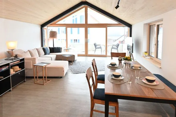 Ferienhaus Halbinsel52 Ferienwohnung Halbinsel52 I Seesicht Wasserburg - Wohn-/Essbereich