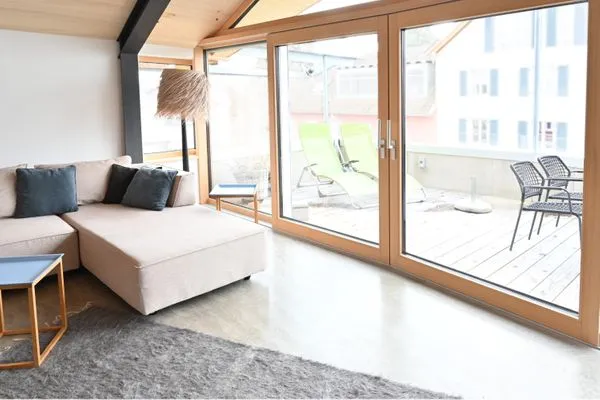 Ferienhaus Halbinsel52 Ferienwohnung Halbinsel52 I Seesicht Wasserburg - Wohnbereich