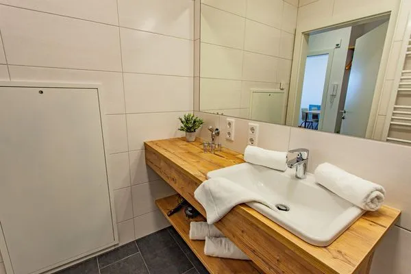 Badezimmer  Happy Aich 2 by Alpenidyll Apartments