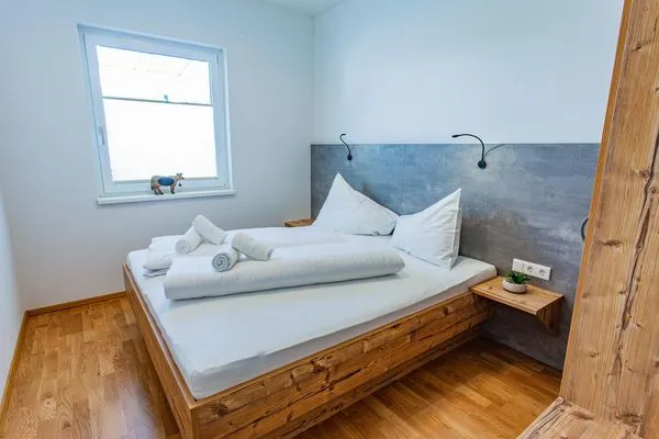 Schlafzimmer 1, Doppelbett  Happy Aich 3 by Alpenidyll Apartments