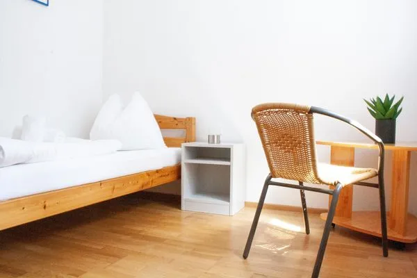Schlafzimmer 2, 1 Einzelbetten  Royal 4 Trend by Alpenidyll Apartments