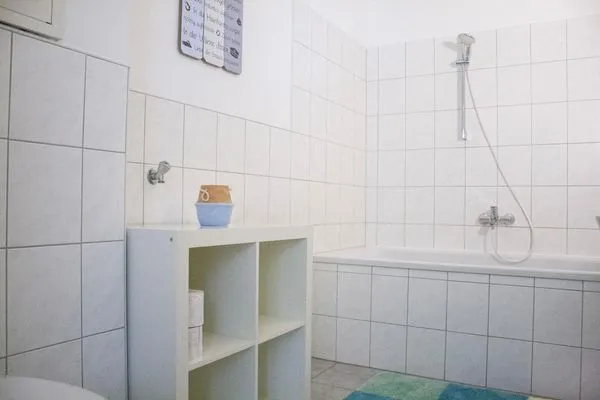 Badezimmer mit Badewanne und WC  Royal 4 Trend by Alpenidyll Apartments