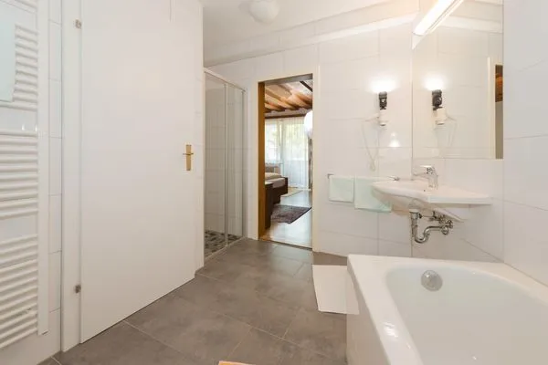 Badewanne und Dusche  City Life 2 by Alpenidyll Apartments