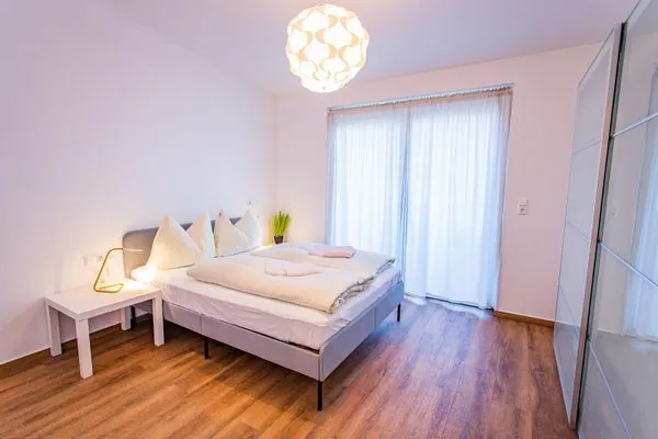 Schlafzimmer 2, Doppelbett  City Dream 1 by Alpenidyll Apartments