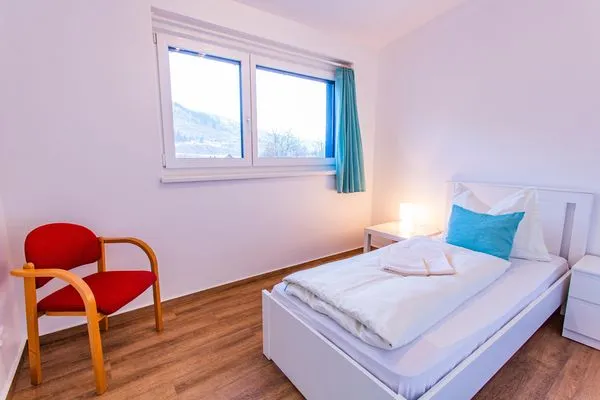 Schlafzimmer 3  City Dream 1 by Alpenidyll Apartments