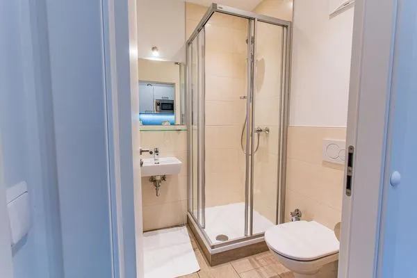 Dusche und WC  City Dream 2 by Alpenidyll Apartments