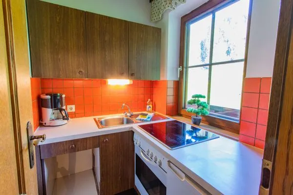 kitchen  Huberhof 8 by Alpenidyll Apartments