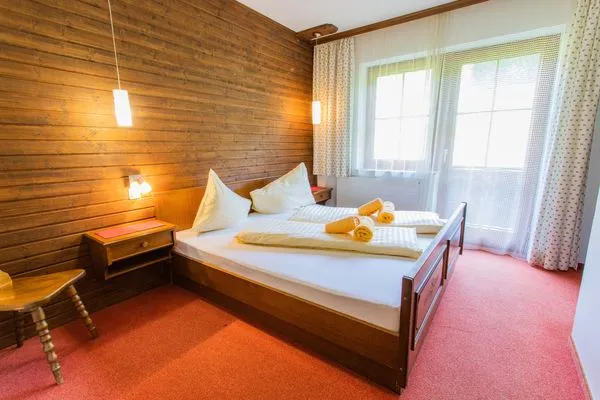 Double bed  Huberhof 8 by Alpenidyll Apartments