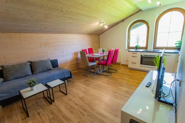 Wohn- und Essbereich, Schlafsofa  Huberhof 9 by Alpenidyll Apartments